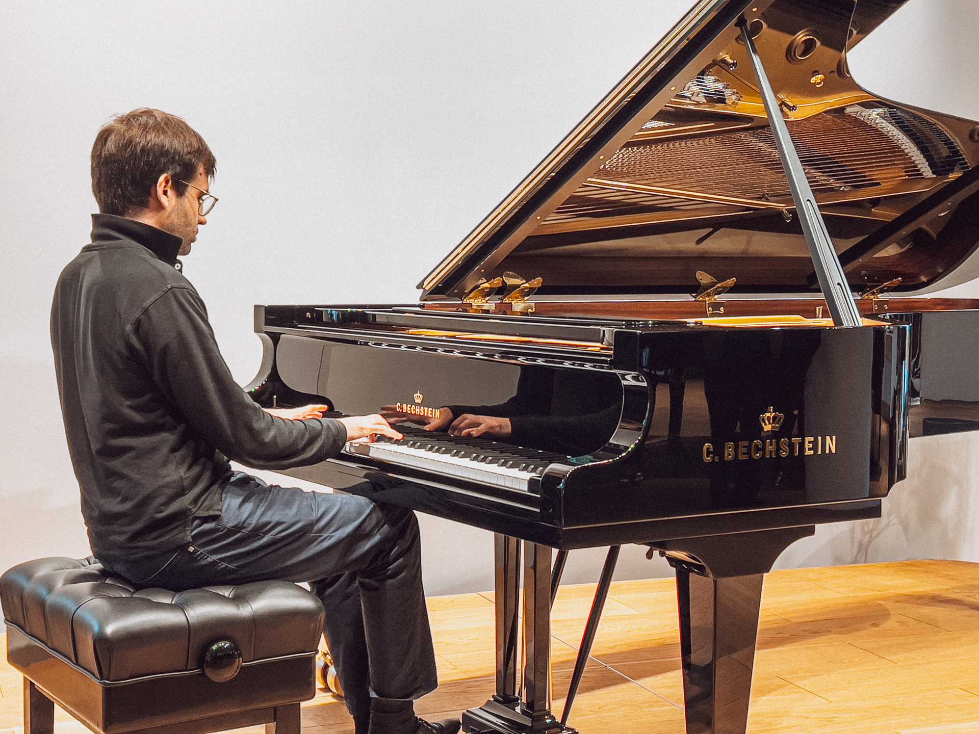 Pianist at grand piano